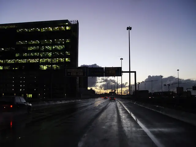 In this given picture, I can see transparent building which is filled with full of lights and...