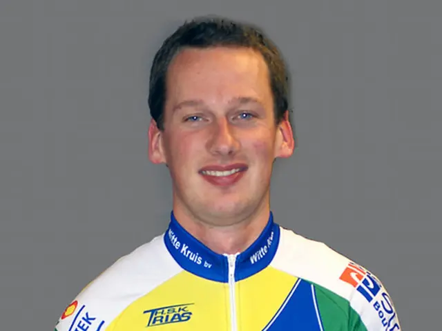 In the picture there is a sports player,he is posing for the photograph and on his shirt there are...